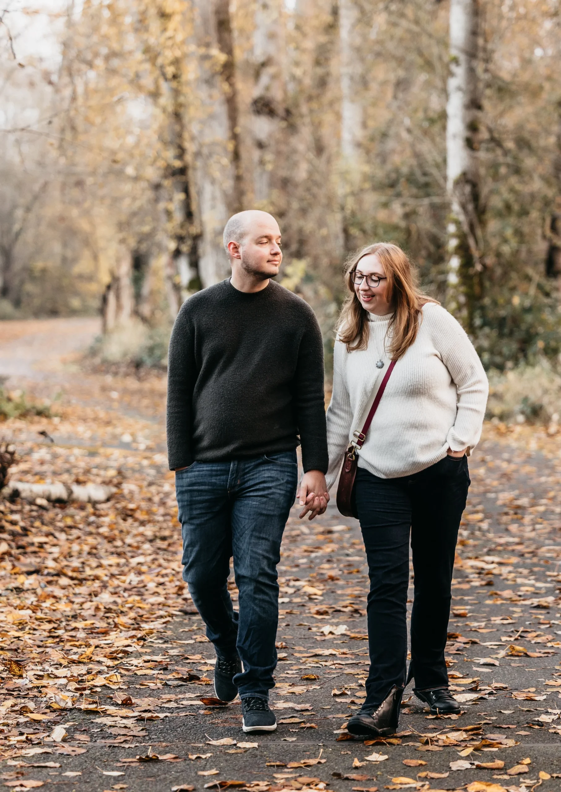 Couple enjoys a photoshoot together at Bothell Landing Park in Bothell, WA