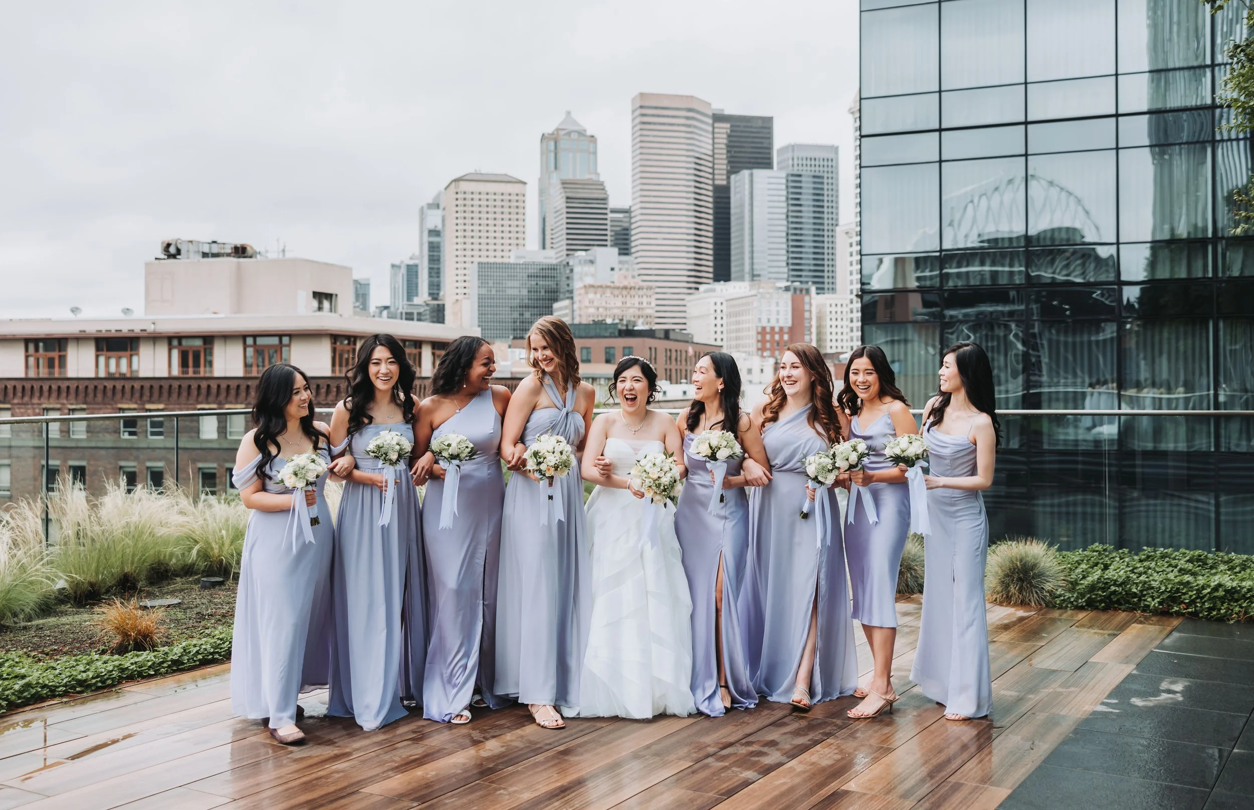 Bridesmaids on a Seattle Rooftop overlooking the Seattle Skyline