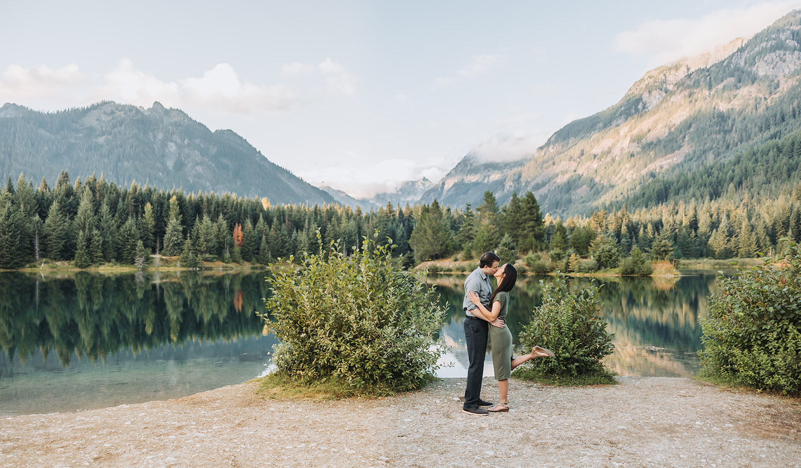 Biracial couple celebrating their engagement session at Gold Creek Pond in Washington State