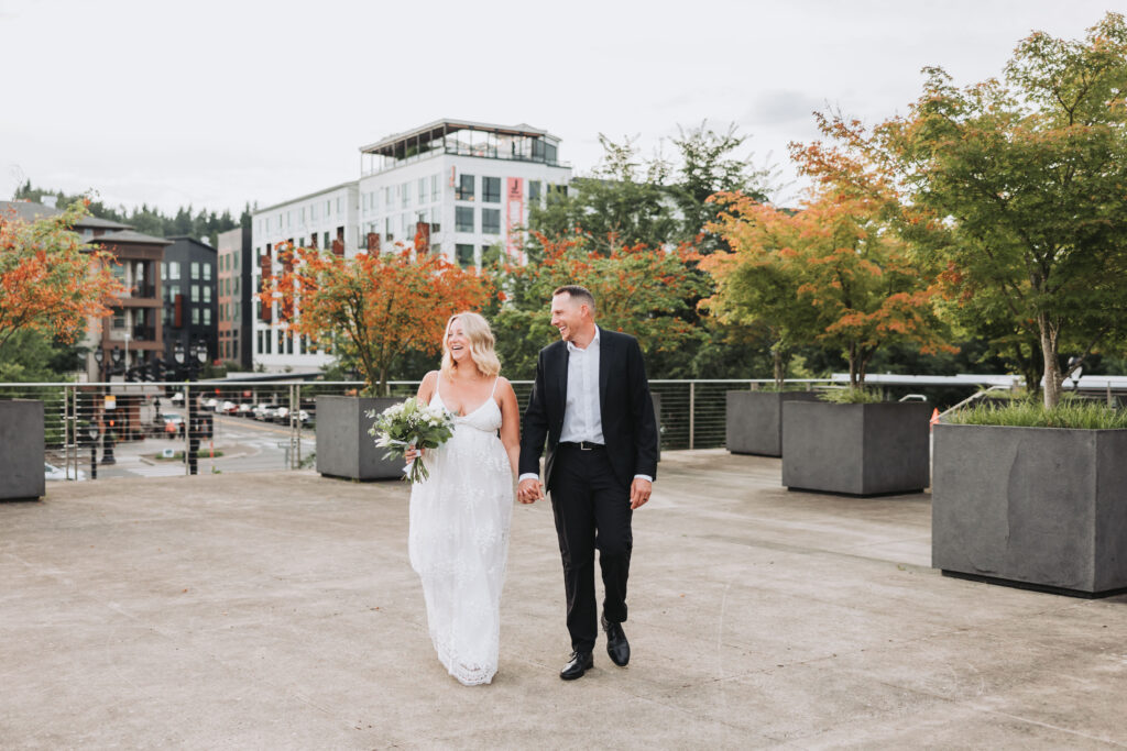 Bride and Groom Enjoying a Moment together at Bothell Courthouse in Bothell, Washington after their Courthouse Elopement Ceremony