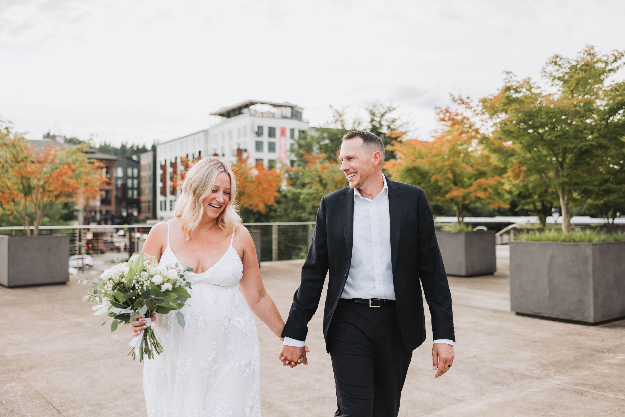 Bride and Groom enjoying a moment after their courthouse elopement in Bothell, Washington