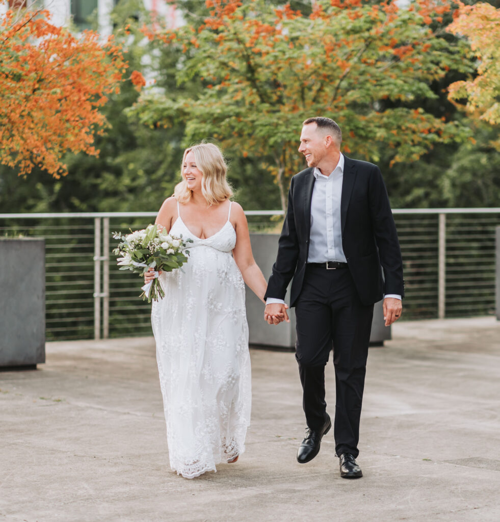 Bride and Groom Enjoying a Moment together at Bothell Courthouse in Bothell, Washington after their Courthouse Elopement Ceremony