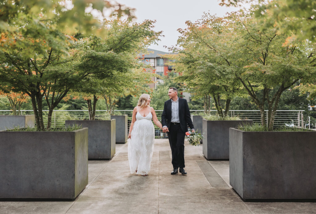 Bride and Groom Enjoying a Moment together at Bothell Courthouse in Bothell, Washington after their Courthouse Elopement Ceremony