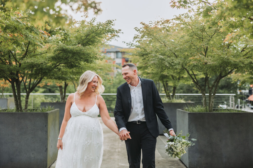 Bride and Groom Enjoying a Moment together at Bothell Courthouse in Bothell, Washington after their Courthouse Elopement Ceremony