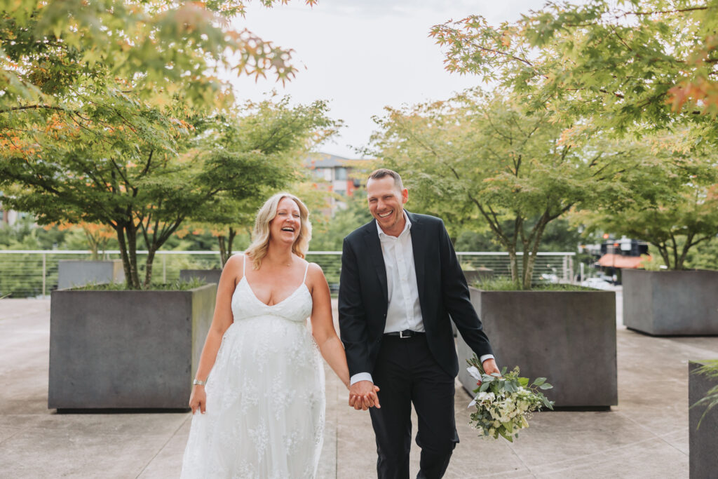 Bride and Groom Enjoying a Moment together at Bothell Courthouse in Bothell, Washington after their Courthouse Elopement Ceremony