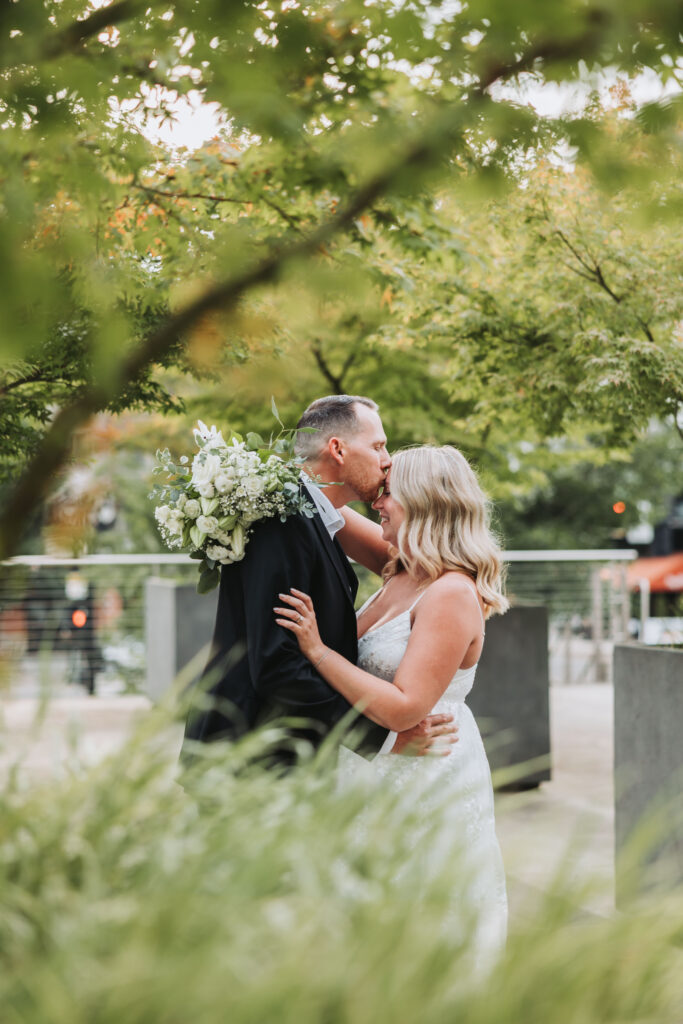 Bride and Groom Enjoying a Moment together at Bothell Courthouse in Bothell, Washington after their Courthouse Elopement Ceremony