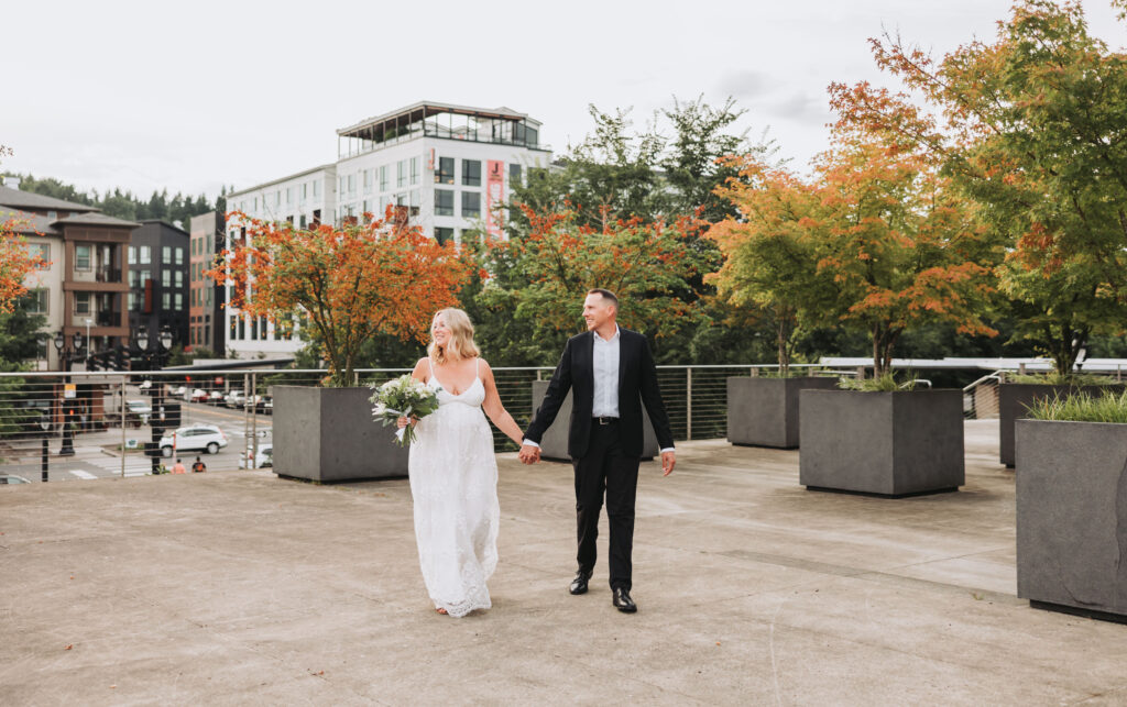 Bride and Groom Enjoying a Moment together at Bothell Courthouse in Bothell, Washington after their Courthouse Elopement Ceremony