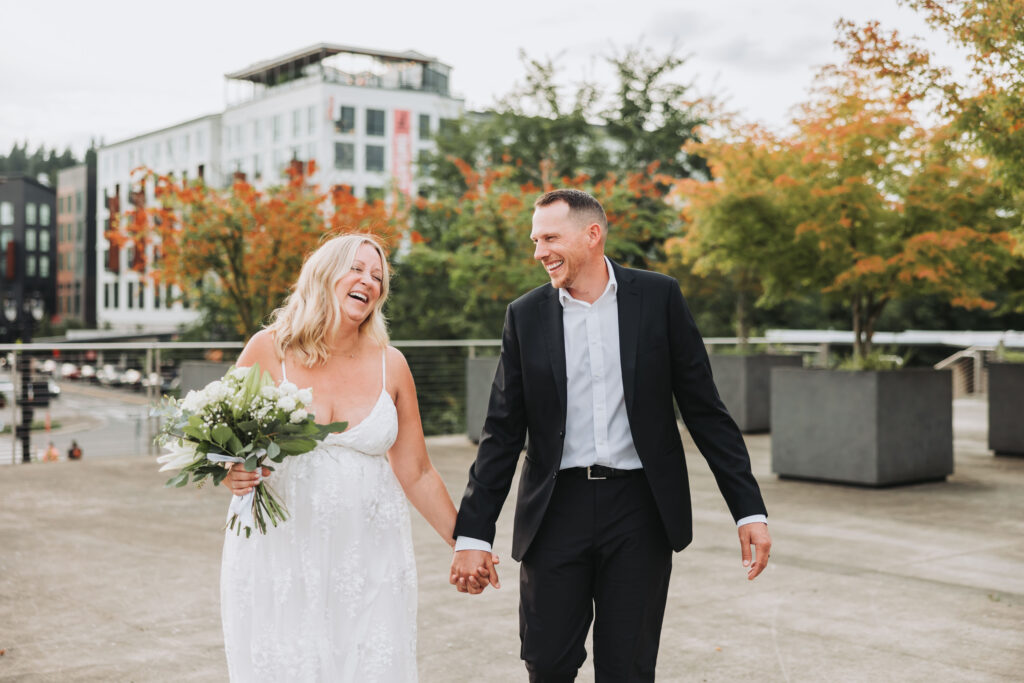 Bride and Groom Enjoying a Moment together at Bothell Courthouse in Bothell, Washington after their Courthouse Elopement Ceremony
