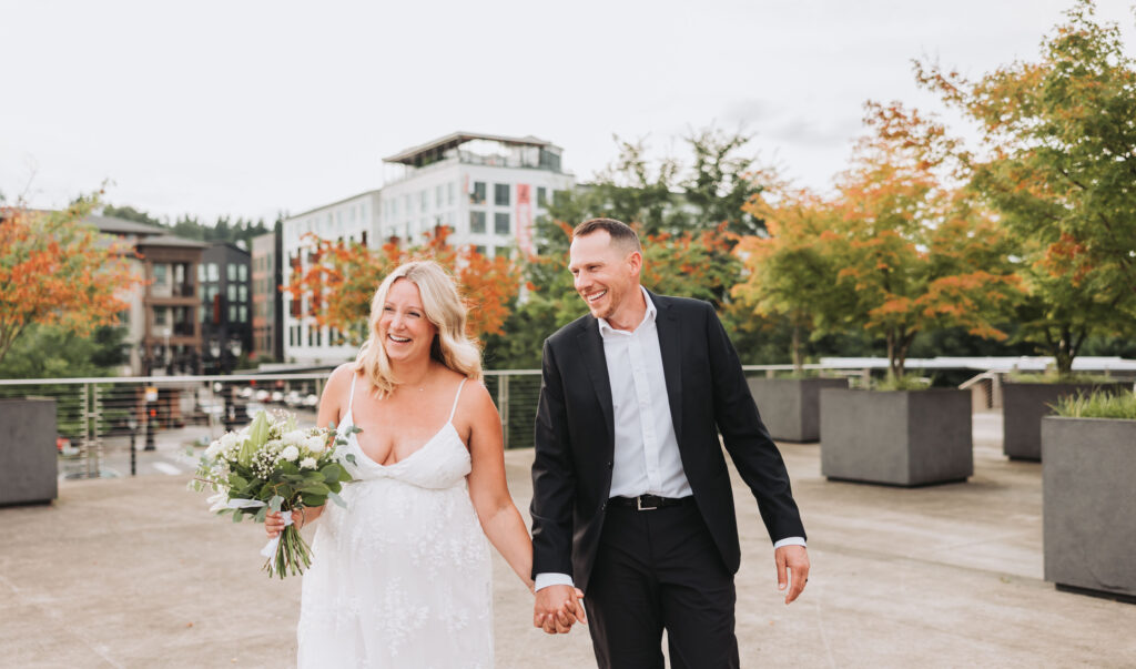 Bride and Groom Enjoying a Moment together at Bothell Courthouse in Bothell, Washington after their Courthouse Elopement Ceremony