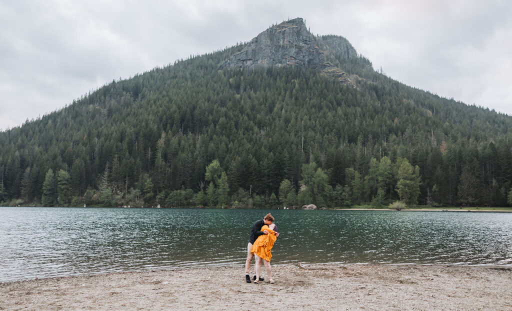 Engaged couple having a moment at Rattlesnake Lake in Washington