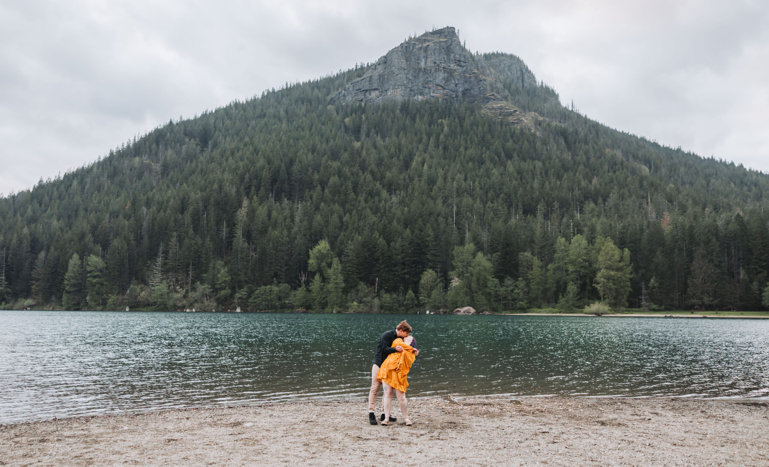 Engaged couple having a moment at Rattlesnake Lake in Washington