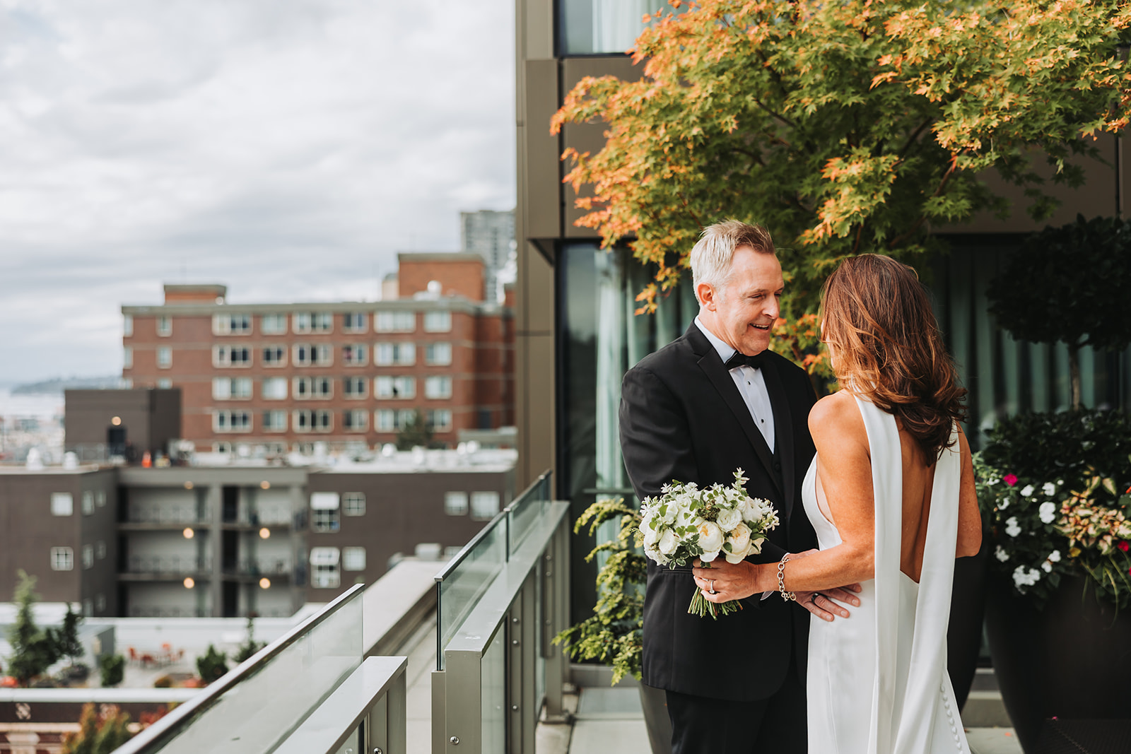 Bride and Groom First Look at Four Seasons Hotel in Downtown Seattle