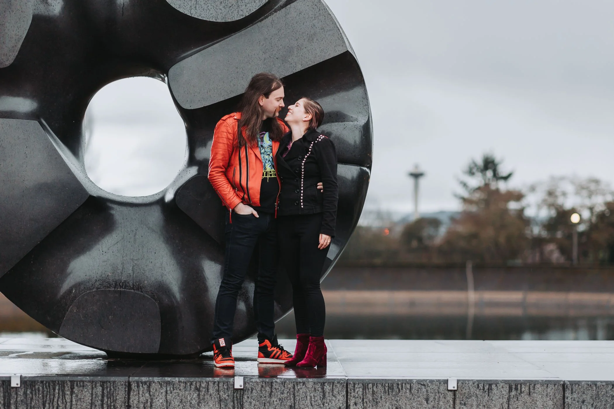 Couple engagement photoshoot at Volunteer Park in Seattle, WA with the Space Needle in the background