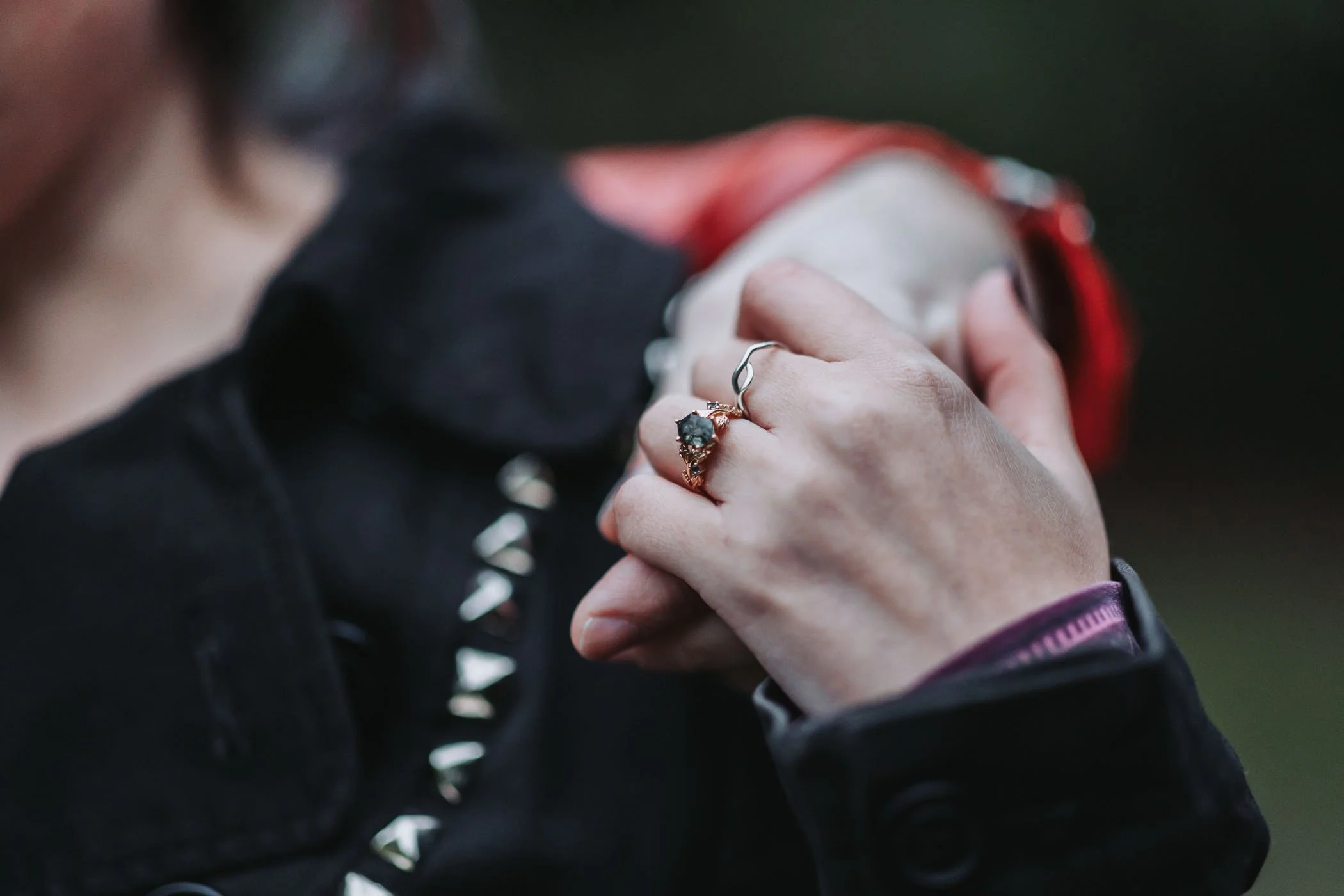 Couple engagement photoshoot at Volunteer Park in Seattle, WA focused on the engagement ring