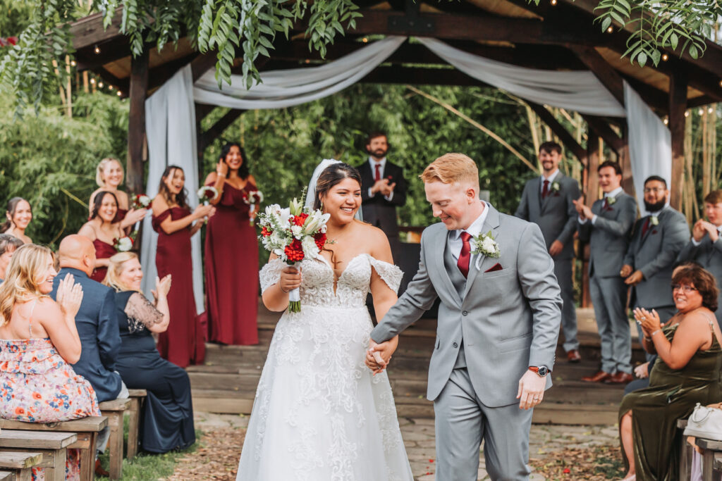 Bride and Groom Walking down the aisle after their Ceremony at Terra Valley Farms in Monroe, WA